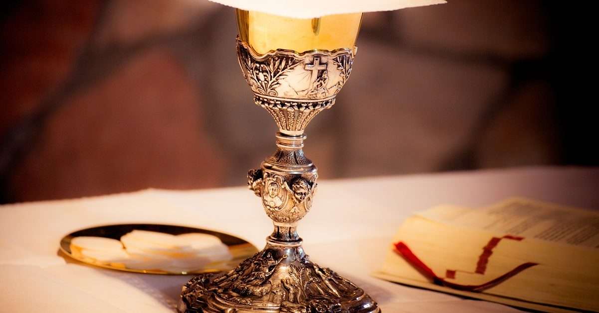 Communion: chalice, wine, prayer